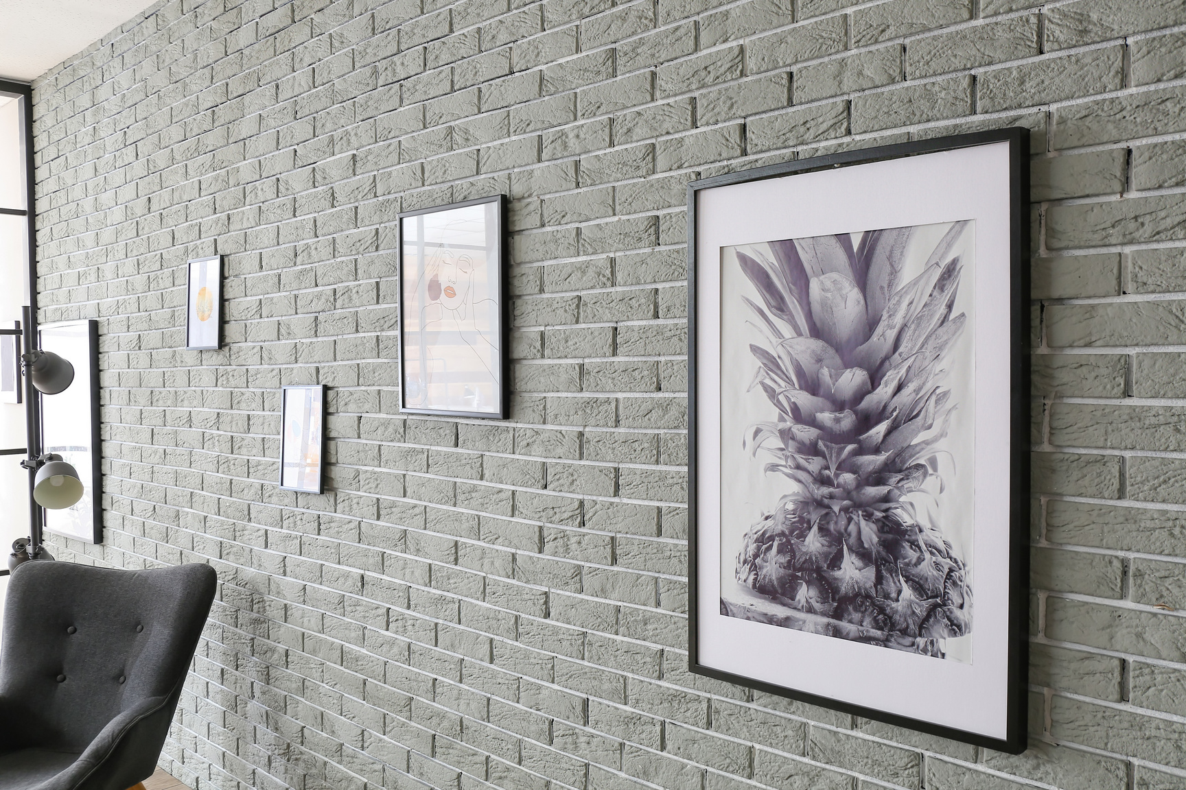 Pictures Hanging on Wall in Art Gallery